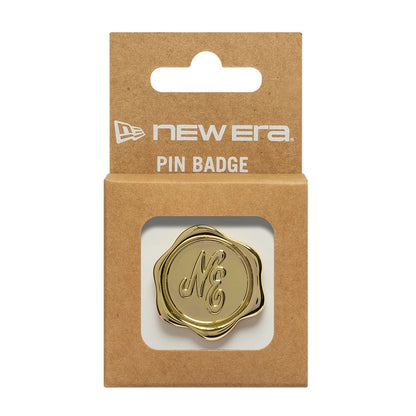 Pictured is this New Era Stamp Pin Badge in gold. 3