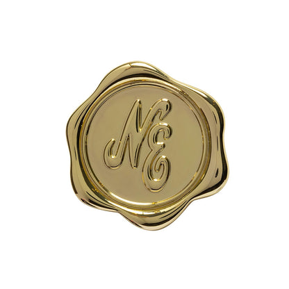 Pictured is this New Era Stamp Pin Badge in gold. 1