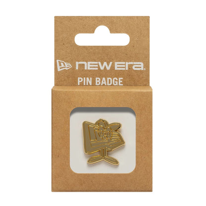 Pictured is this New Era Flag Character Pin Badge in gold. 3