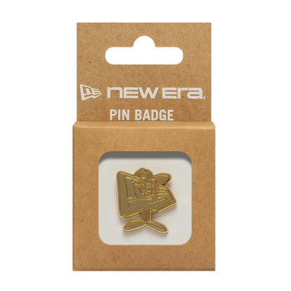 Pictured is this New Era Flag Character Pin Badge in gold. 3