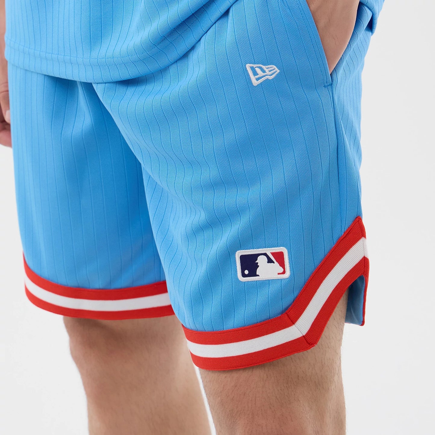 The model is wearing this MLB Arch New York Yankees Oversized Shorts in pastel blue. 5