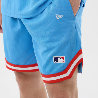 The model is wearing this MLB Arch New York Yankees Oversized Shorts in pastel blue. 5