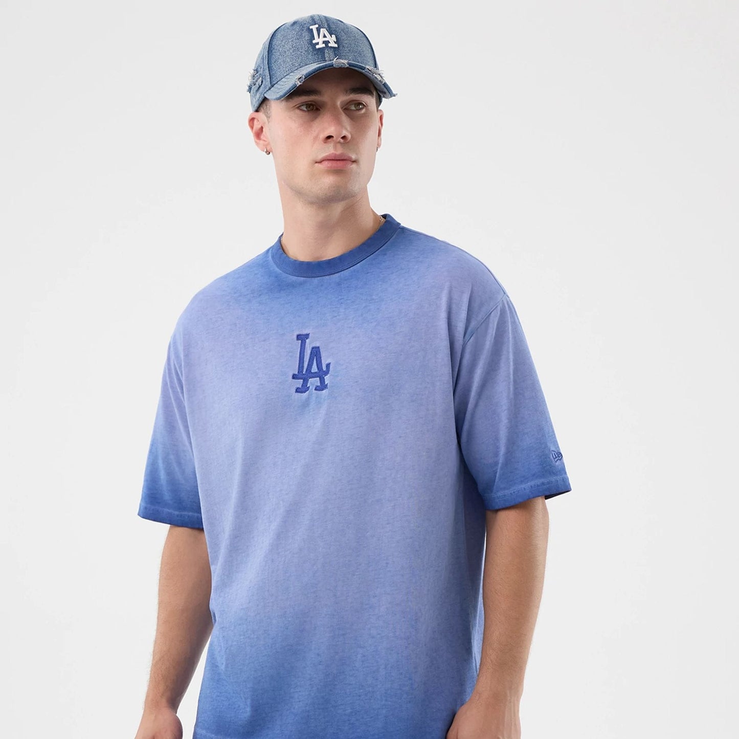 The model is wearing this MLB Washed Logo LA Dodgers T-Shirt in pastel blue. 3