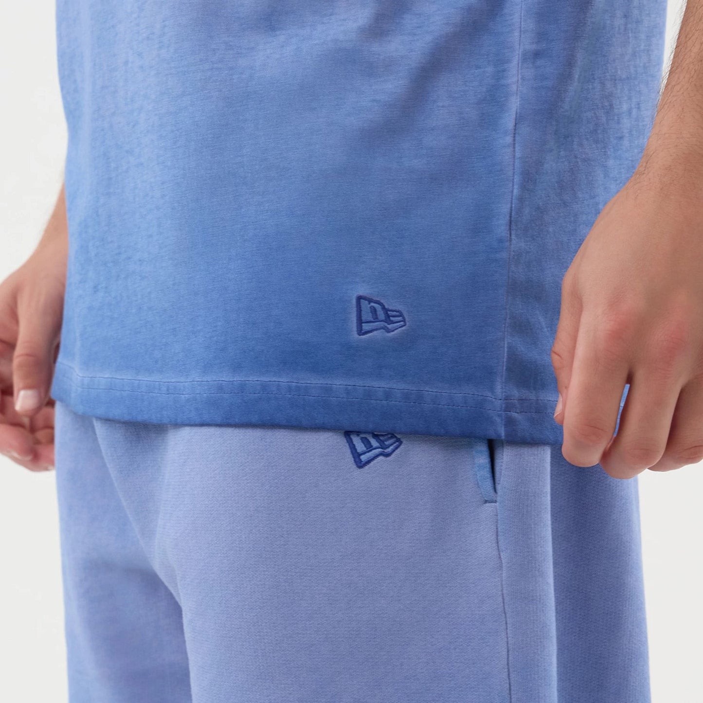 The model is wearing this MLB Washed Logo LA Dodgers Vest in pastel blue. 5