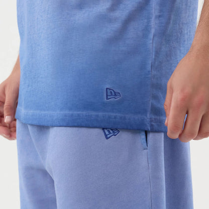 The model is wearing this MLB Washed Logo LA Dodgers Vest in pastel blue. 5