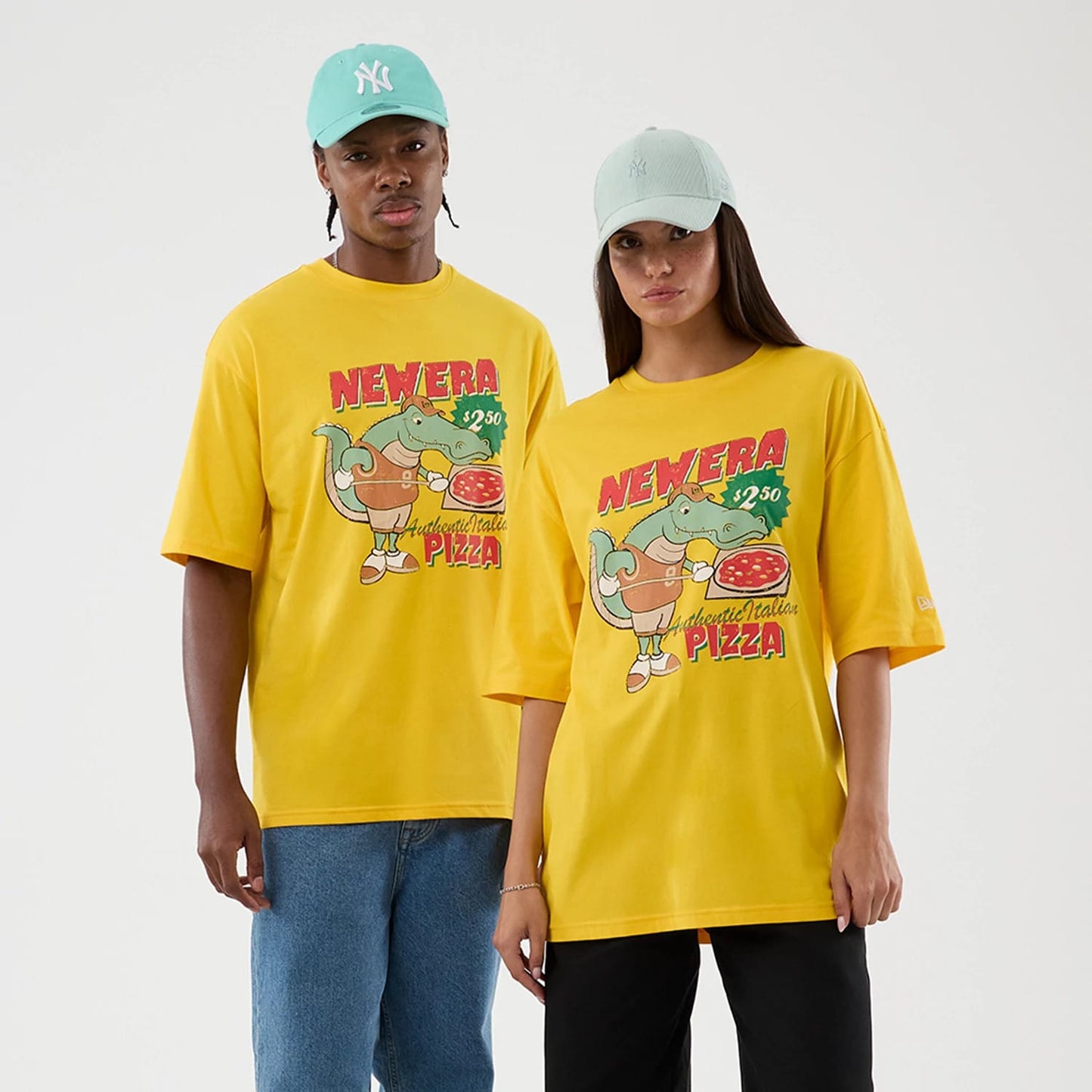 The model is wearing this New Era Alligator Character Graphic T-Shirt in yellow. 1