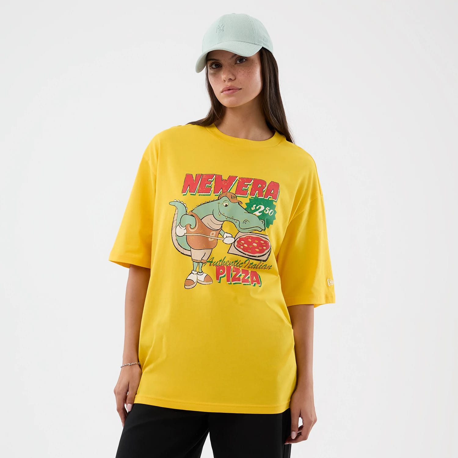 The model is wearing this New Era Alligator Character Graphic T-Shirt in yellow. 4