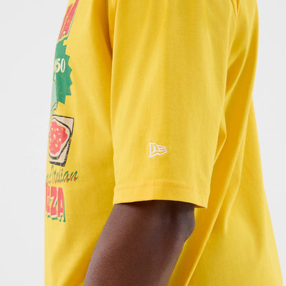 The model is wearing this New Era Alligator Character Graphic T-Shirt in yellow. 7