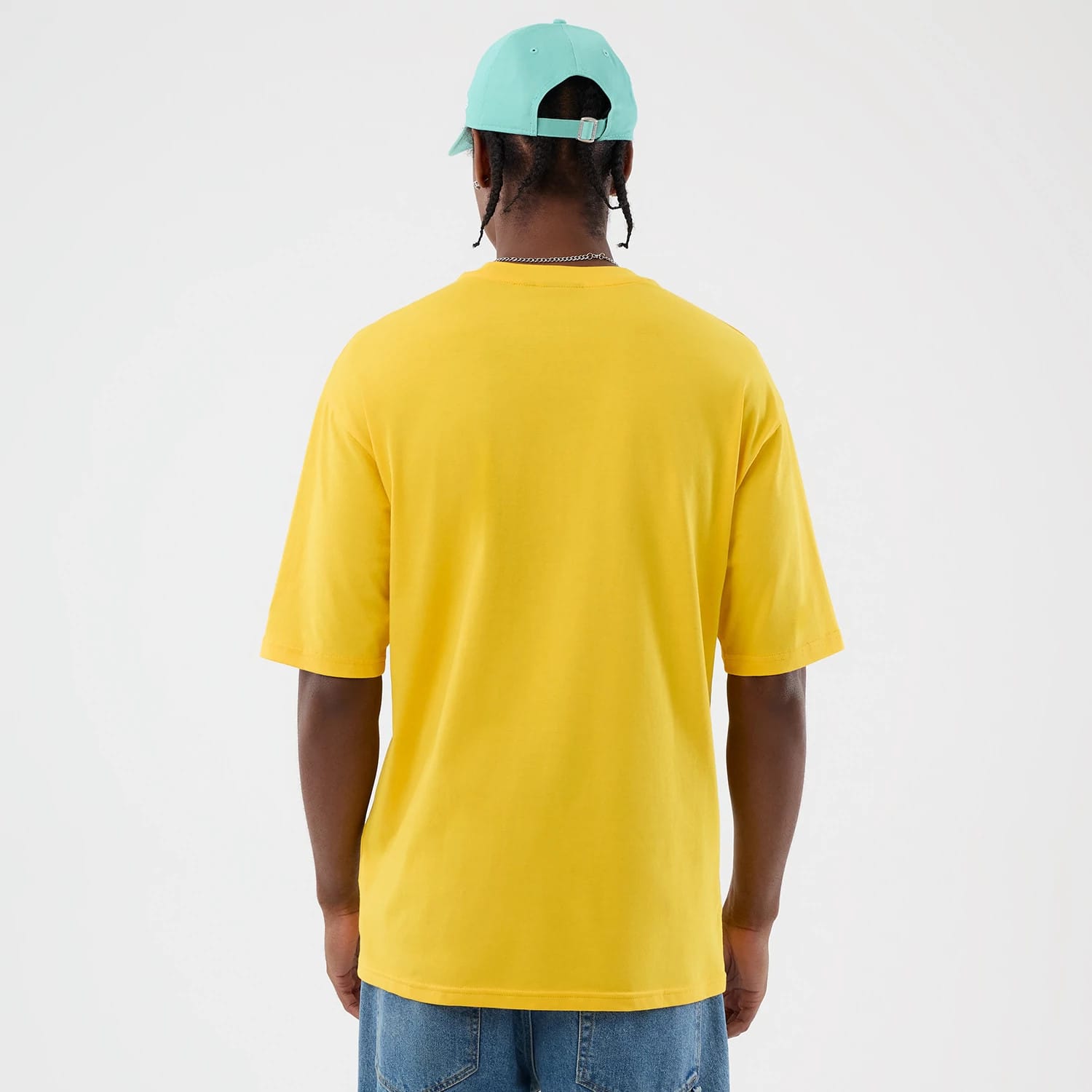 The model is wearing this New Era Alligator Character Graphic T-Shirt in yellow. 2