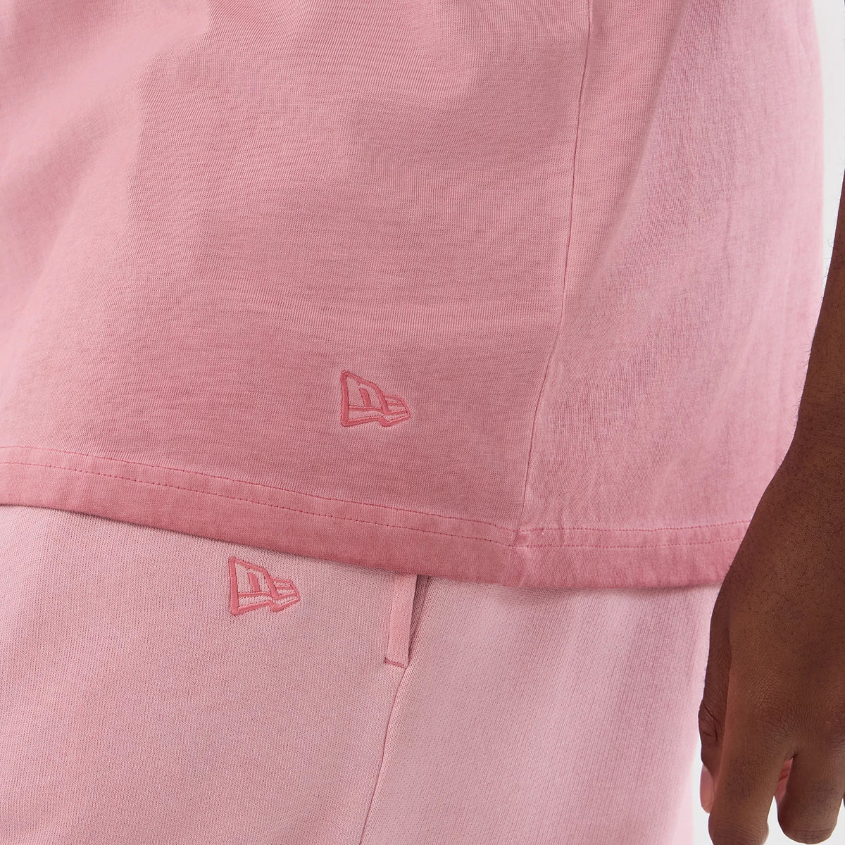 The model is wearing this MLB Washed Logo New York Yankees Vest in pastel pink. 7