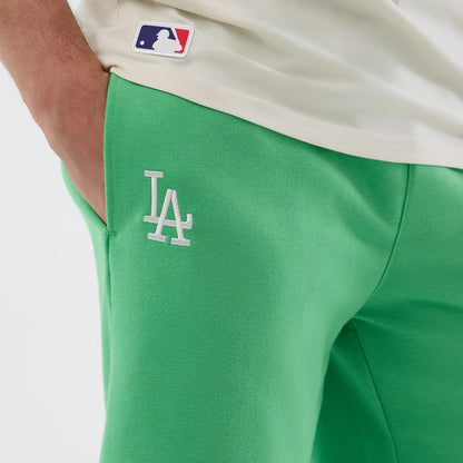 The model is wearing this MLB League Essential LA Dodgers Shorts in open green. 4