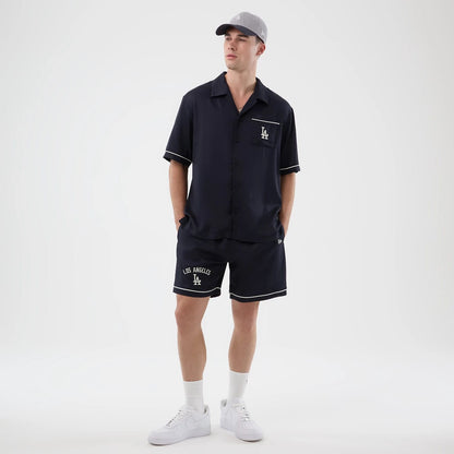 The model is wearing this MLB Graphic Revere LA Dodgers Short Sleeve Shirt in navy. 8