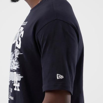 The model is wearing this MLB Slub LA Dodgers Oversized T-Shirt in navy. 5