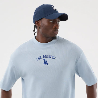 The model is wearing this MLB Waffle LA Dodgers T-Shirt in pastel blue. 4