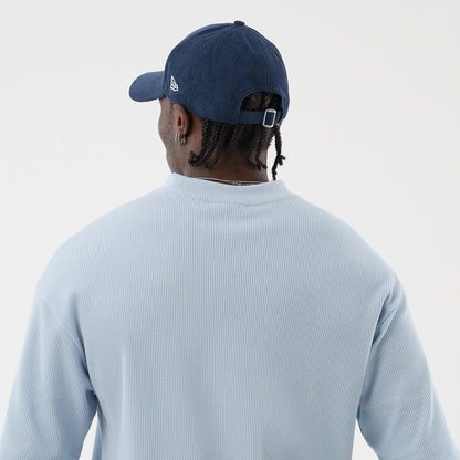 The model is wearing this MLB Waffle LA Dodgers T-Shirt in pastel blue. 5