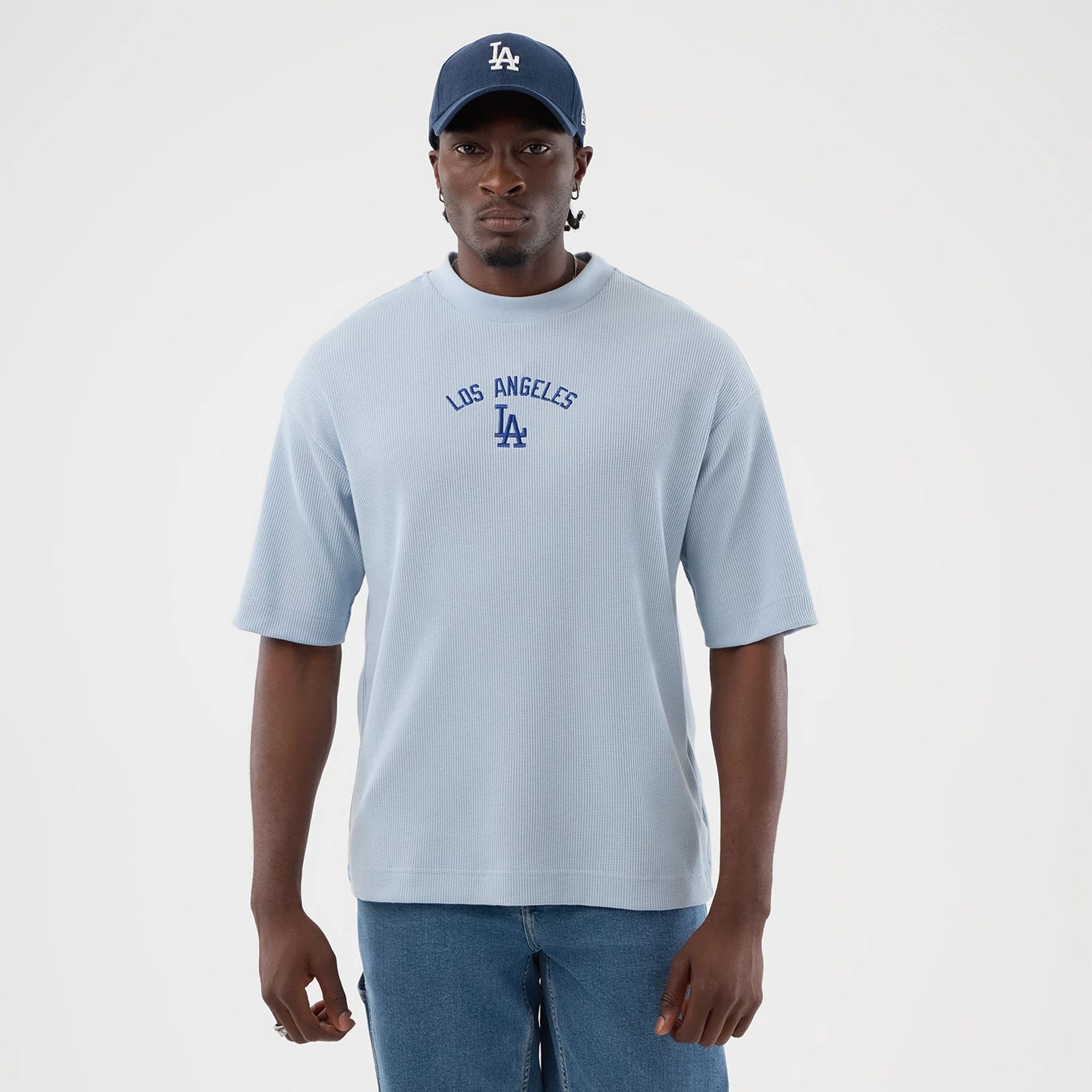 The model is wearing this MLB Waffle LA Dodgers T-Shirt in pastel blue. 1