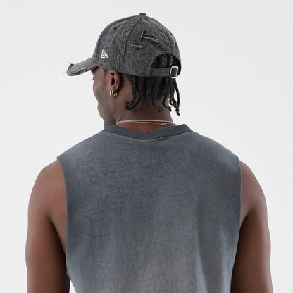 The model is wearing this MLB Washed Logo New York Yankees Vest in black. 7