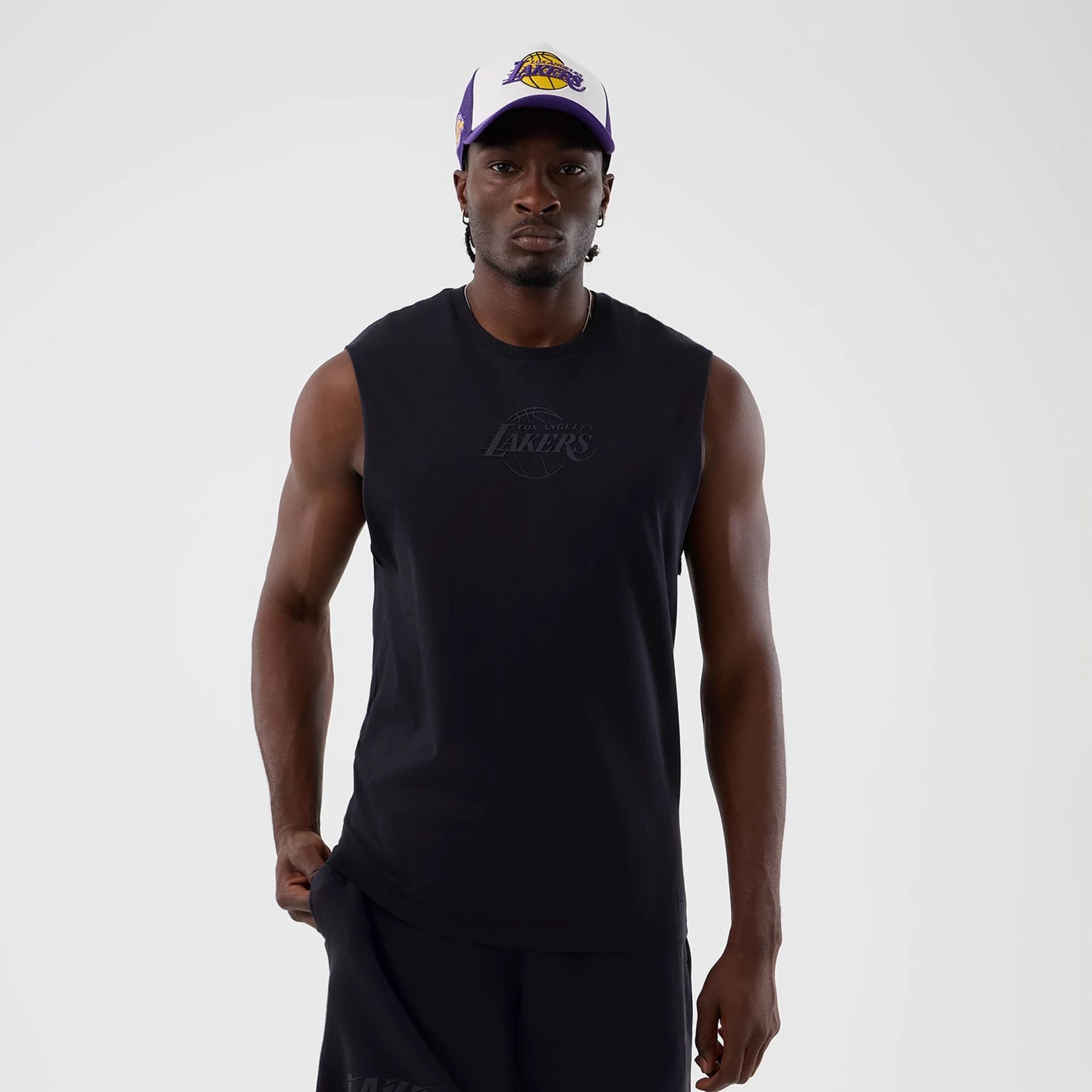 The model is wearing this NBA Core Plus LA Lakers Vest in navy. 1