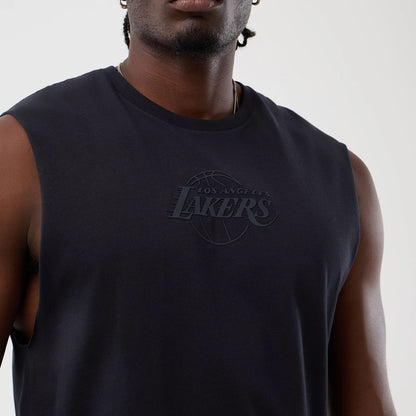 The model is wearing this NBA Core Plus LA Lakers Vest in navy. 5