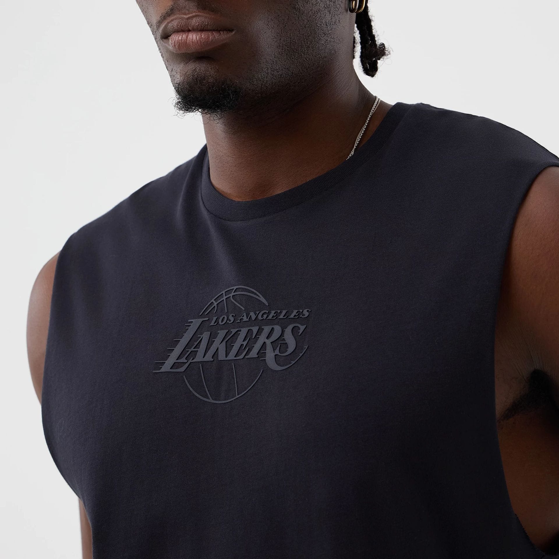 The model is wearing this NBA Core Plus LA Lakers Vest in navy. 6