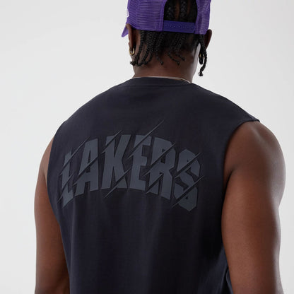 The model is wearing this NBA Core Plus LA Lakers Vest in navy. 4