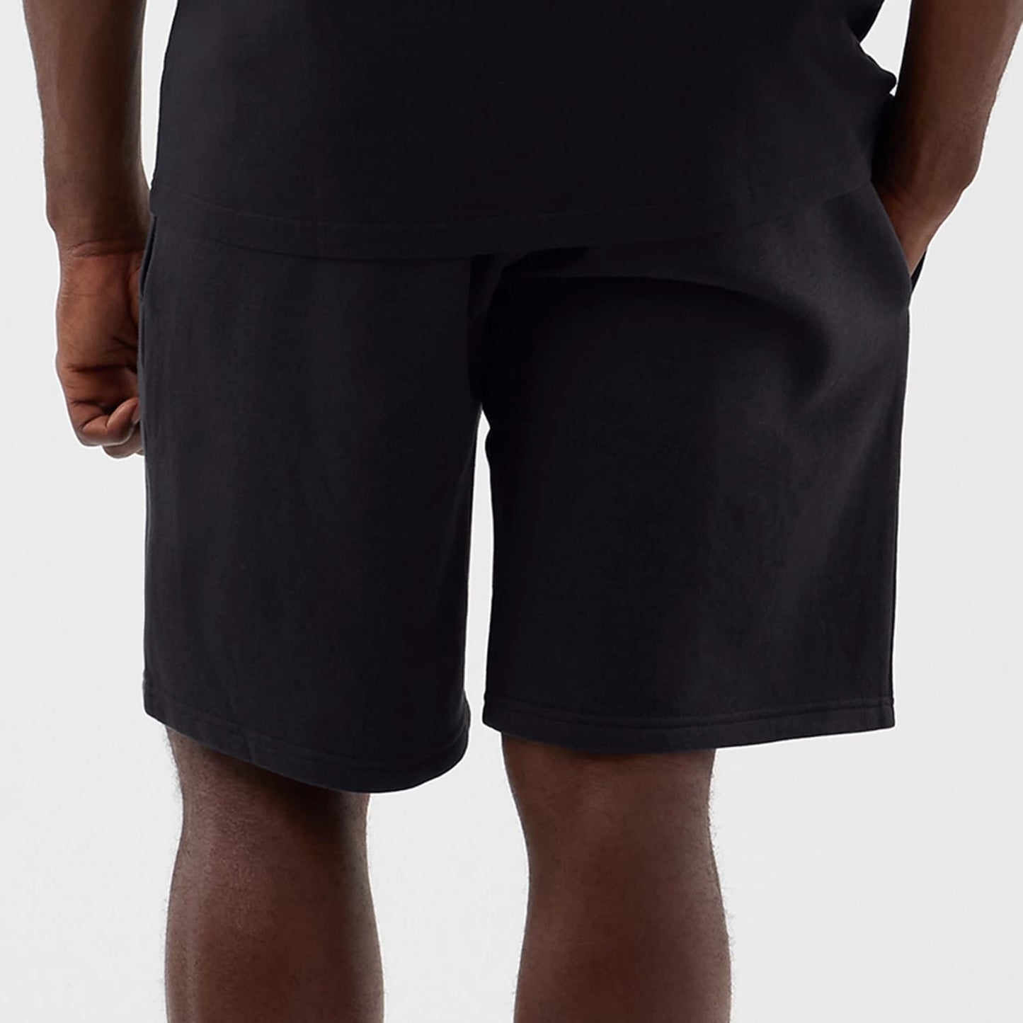 The model is wearing this NBA Core Plus LA Lakers Shorts in navy. 6