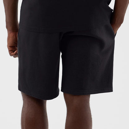 The model is wearing this NBA Core Plus LA Lakers Shorts in navy. 6