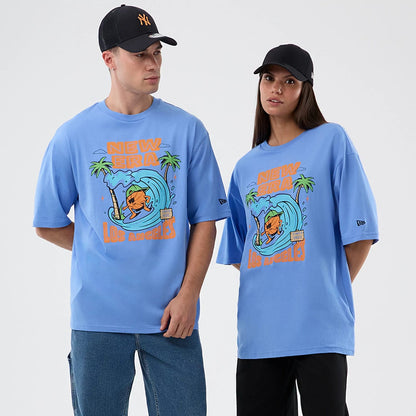 The model is wearing this New Era Basketball Character Graphic T-Shirt in pastel blue. 1