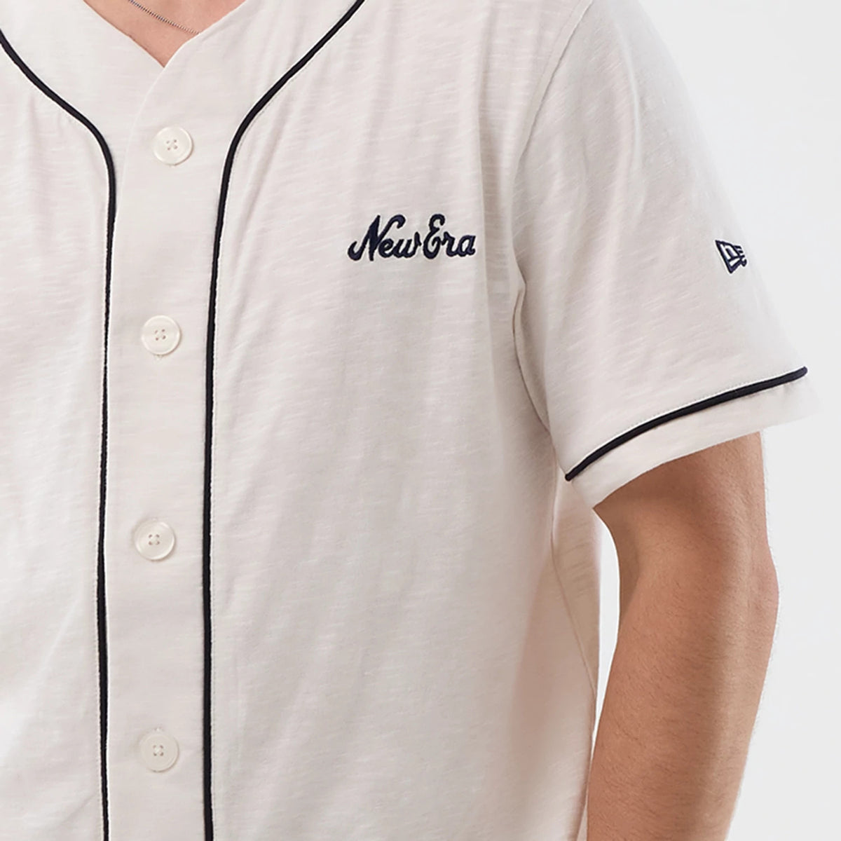 The model is wearing this New Era Slub Baseball Jersey in open white. 6