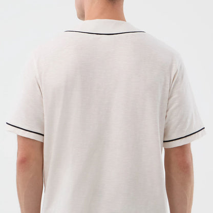 The model is wearing this New Era Slub Baseball Jersey in open white. 7