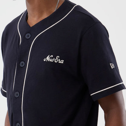 The model is wearing this New Era Slub Baseball Jersey in navy. 5