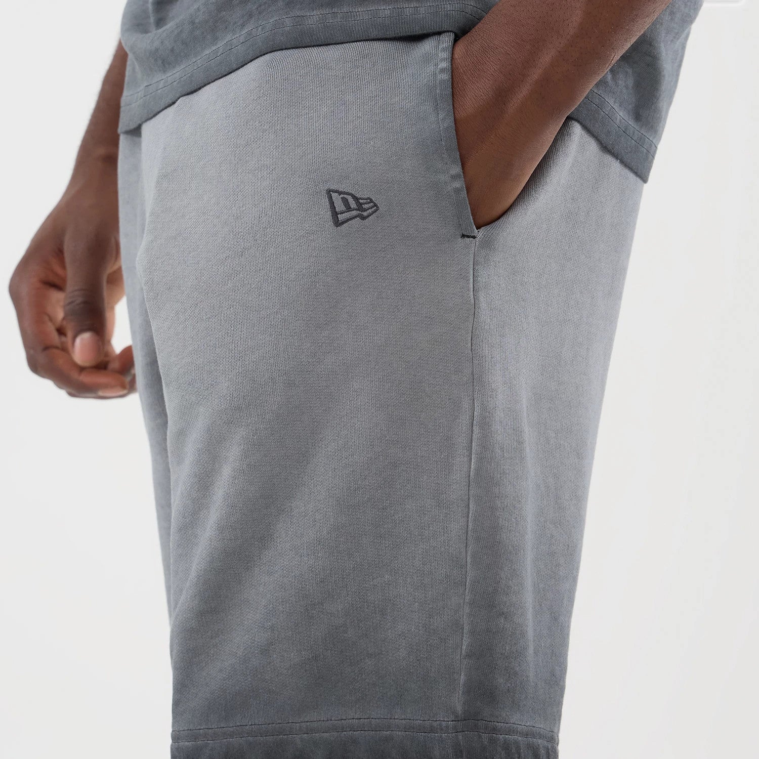 The model is wearing this MLB Washed Logo New York Yankees Shorts in black. 4