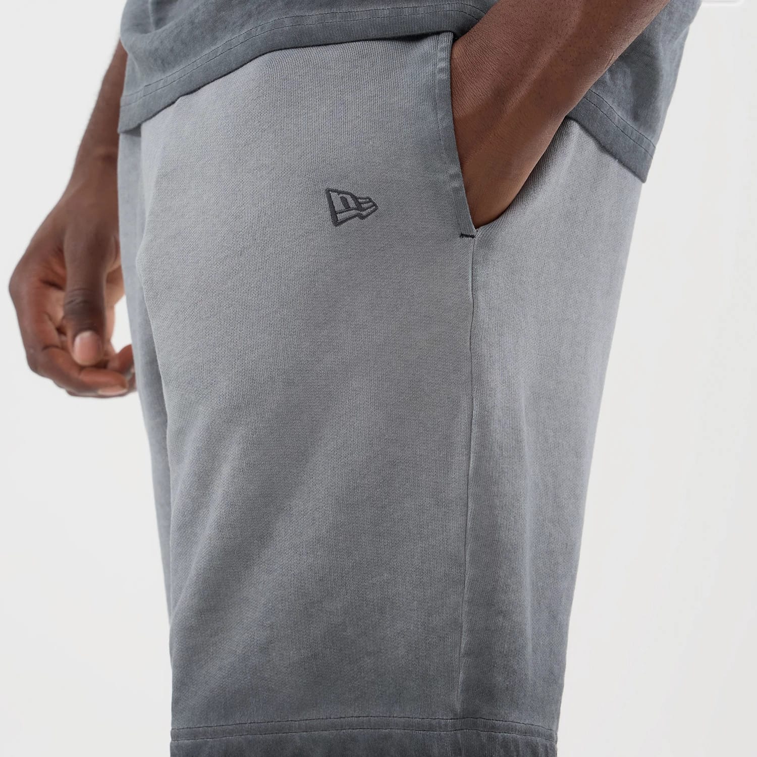 The model is wearing this MLB Washed Logo New York Yankees Shorts in black. 4