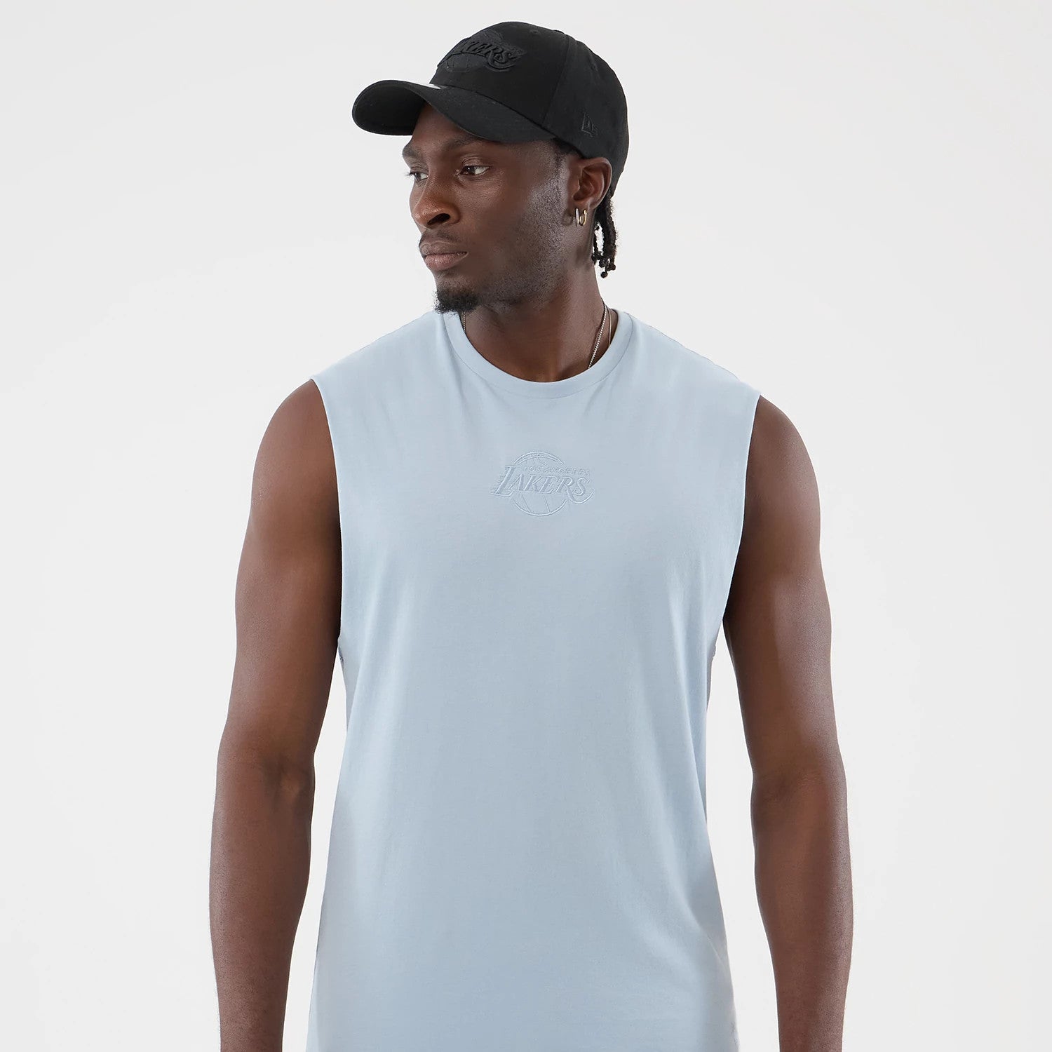 The model is wearing this NBA League Essential LA Lakers Vest in pastel blue. 3