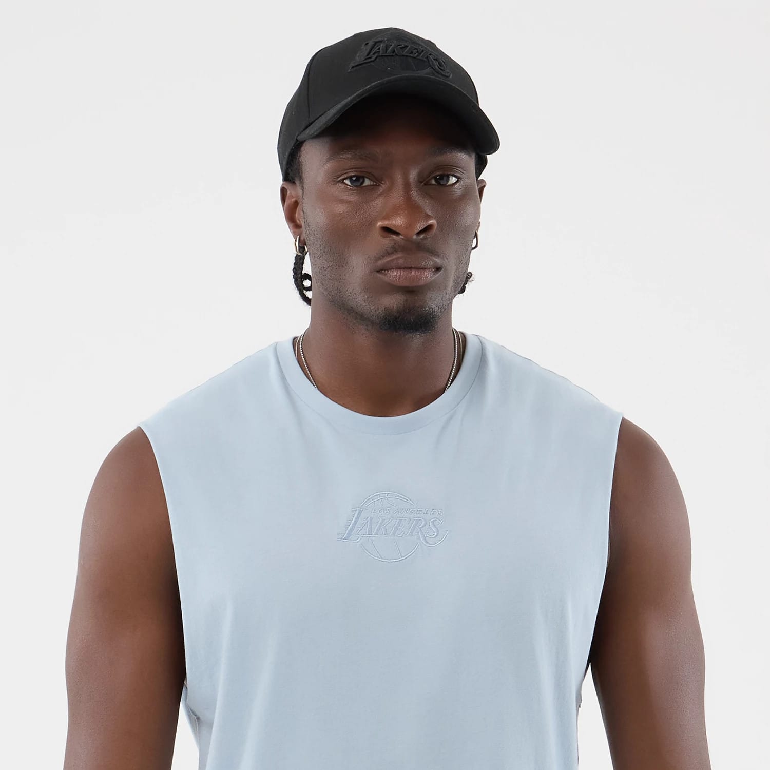 The model is wearing this NBA League Essential LA Lakers Vest in pastel blue. 6