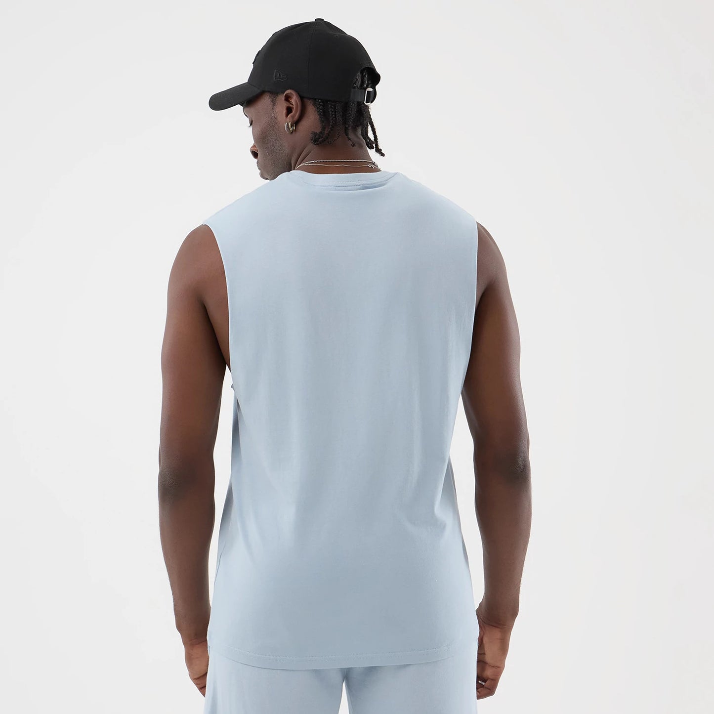 The model is wearing this NBA League Essential LA Lakers Vest in pastel blue. 2