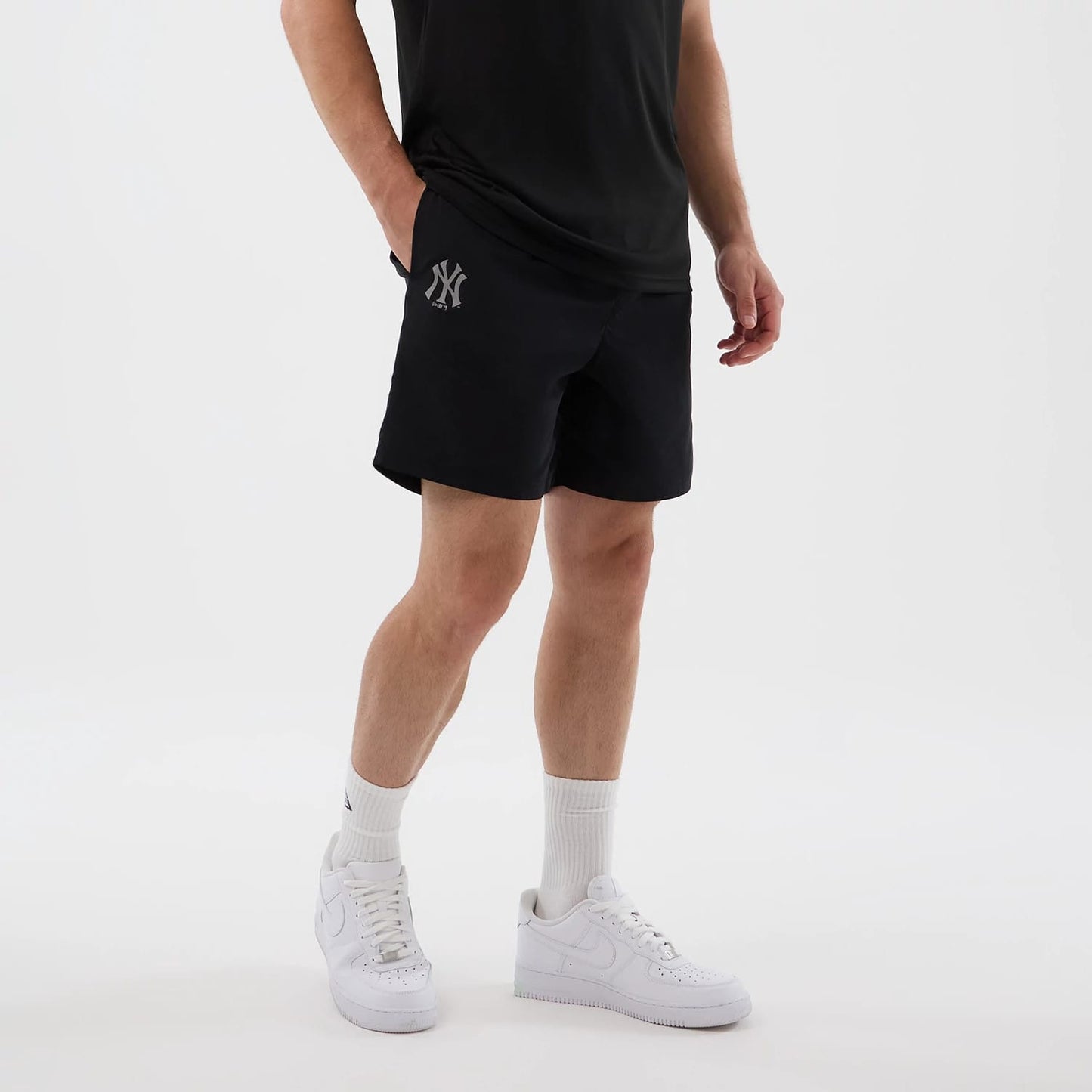 The model is wearing this MLB Core Plus New York Yankees Shorts in black. 7