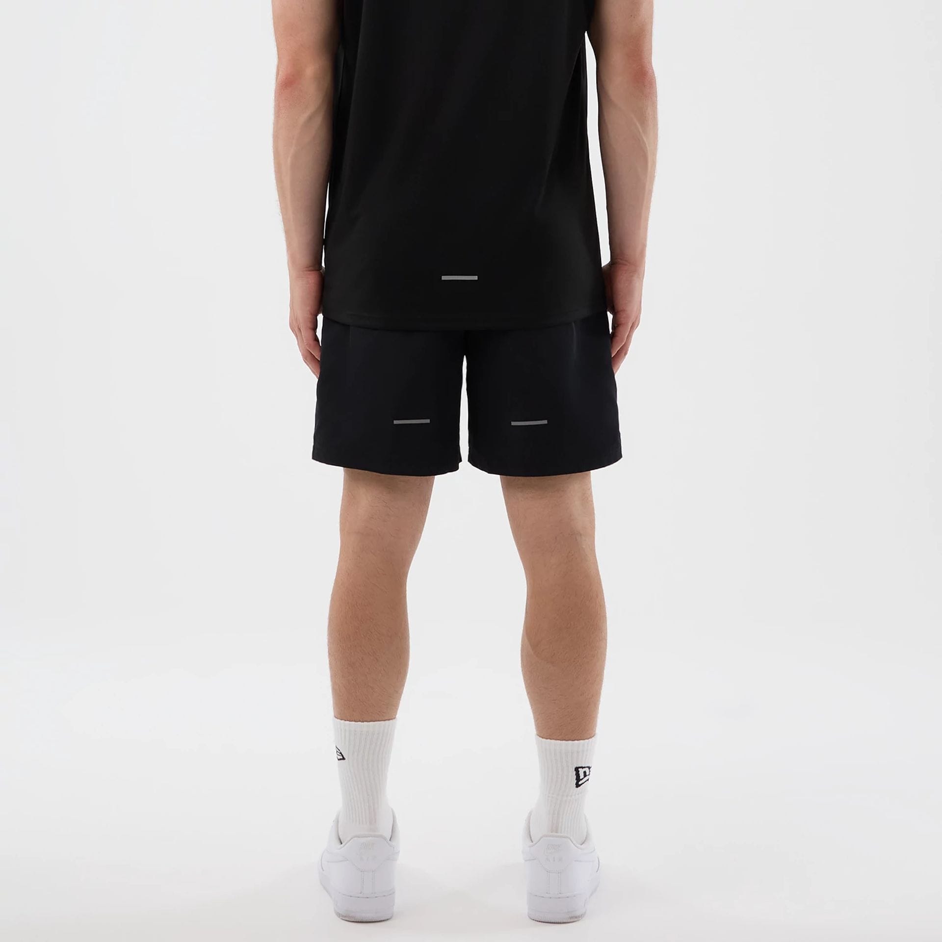 The model is wearing this MLB Core Plus New York Yankees Shorts in black. 2