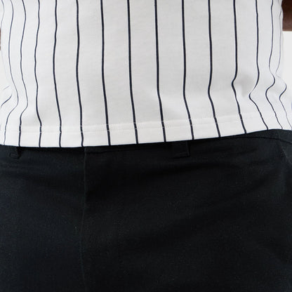 The model is wearing this New Era Cargo Shorts in black. 4