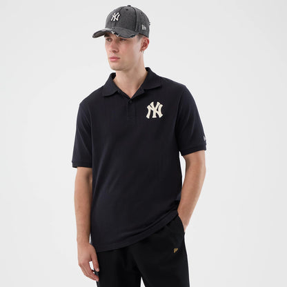 The model is wearing this MLB Rib New York Yankees Polo T-Shirt in navy. 3