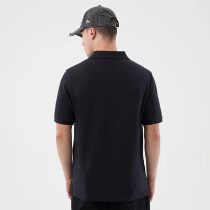 The model is wearing this MLB Rib New York Yankees Polo T-Shirt in navy. 2