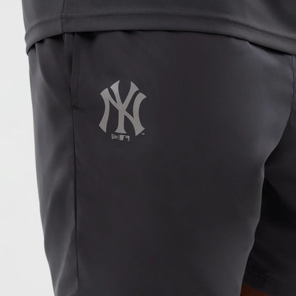 The model is wearing this MLB Core Plus New York Yankees Shorts in dark grey. 3