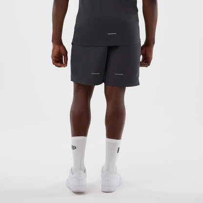 The model is wearing this MLB Core Plus New York Yankees Shorts in dark grey. 2
