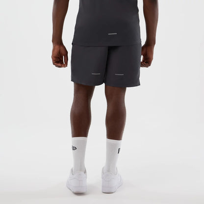 The model is wearing this MLB Core Plus New York Yankees Shorts in dark grey. 2