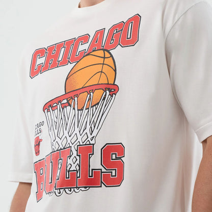 The model is wearing this NBA Basketball Graphic Chicago Bulls Oversized T-Shirt in white. 4