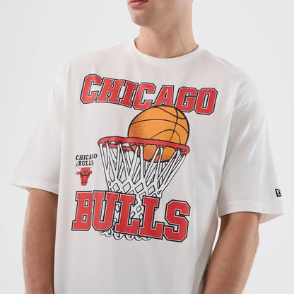 The model is wearing this NBA Basketball Graphic Chicago Bulls Oversized T-Shirt in white. 5