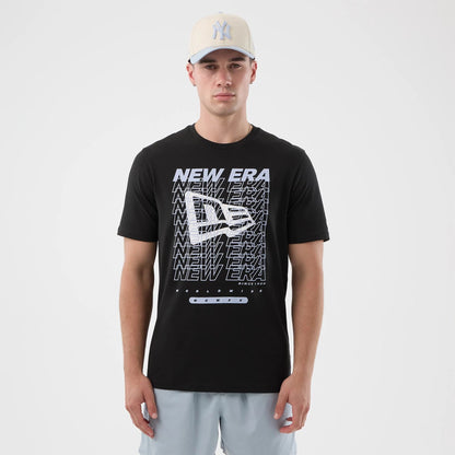 The model is wearing this New Era Logo Graphic T-Shirt in black. 1