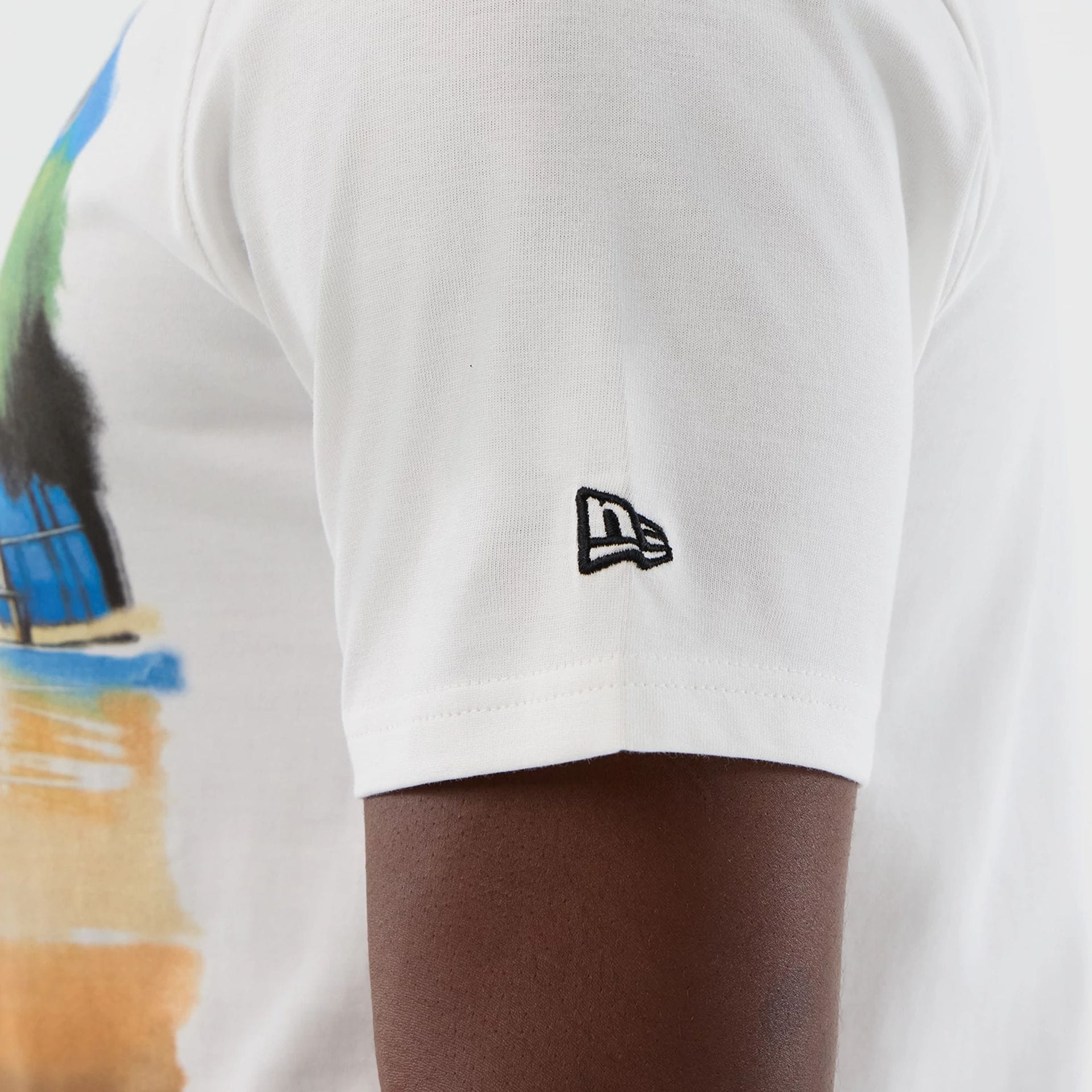 The model is wearing this NBA Beach Graphic LA Lakers T-Shirt in white. 6