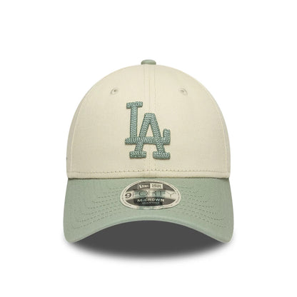 Pictured is this MLB Side Script LA Dodgers 9FORTY M-Crown cap in Cream. 2