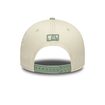 Pictured is this MLB Side Script LA Dodgers 9FORTY M-Crown cap in Cream. 4